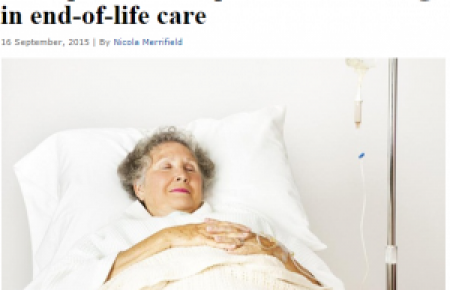 woman lying in hospital bed photograph